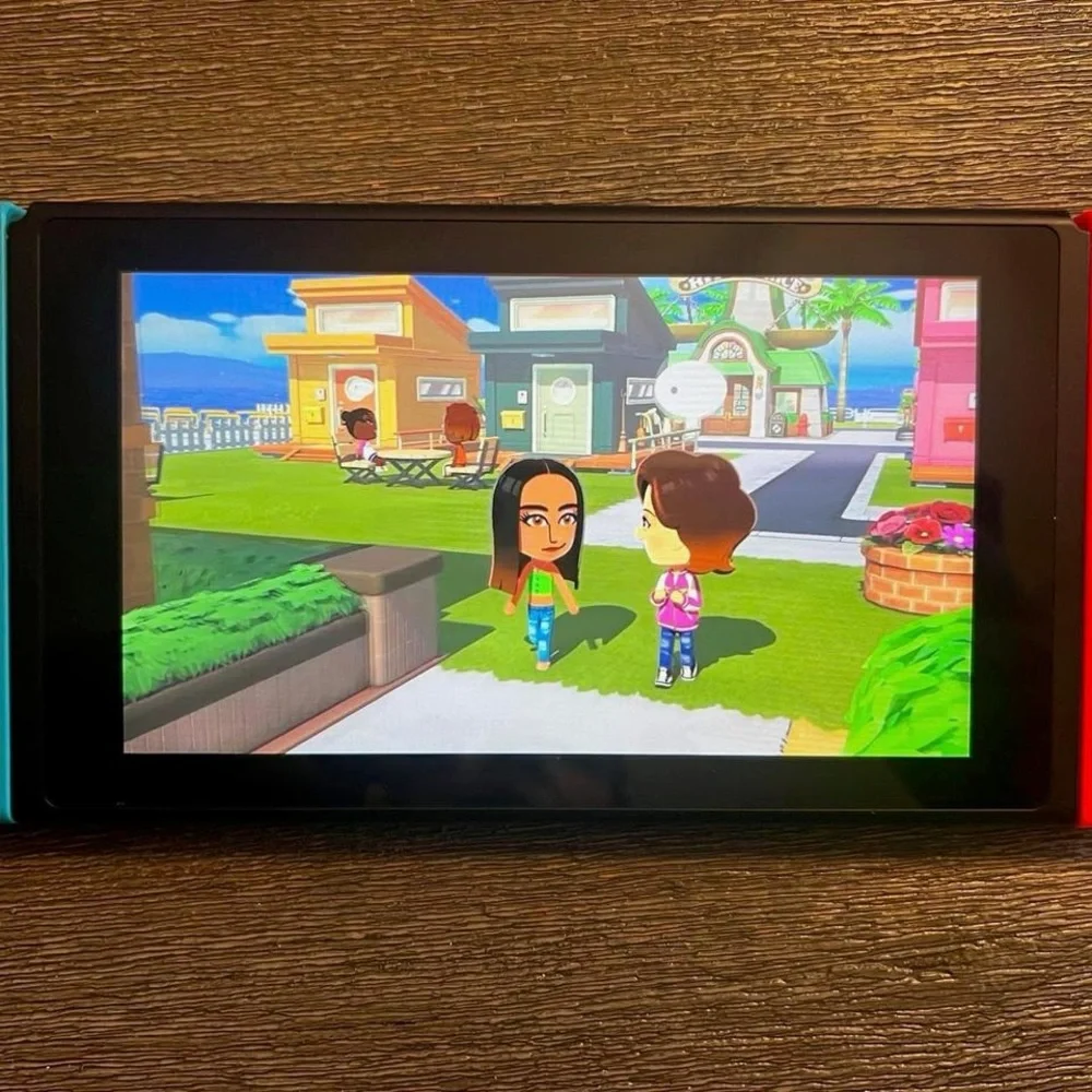 Nintendo Switch Console with Red and Blue Joy-Con